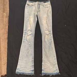 Blue Flare Distressed Jeans with Raw Hem